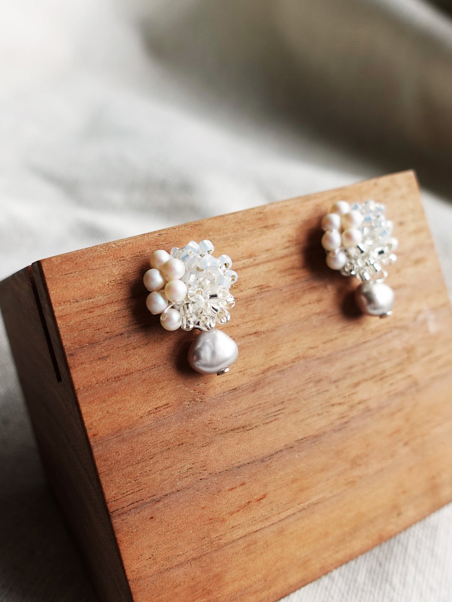 Andelle Lilith Earrings in Grey Display Left