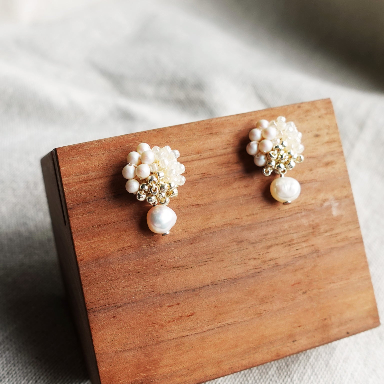 Andelle Lilith Earrings in Ivory Display Left