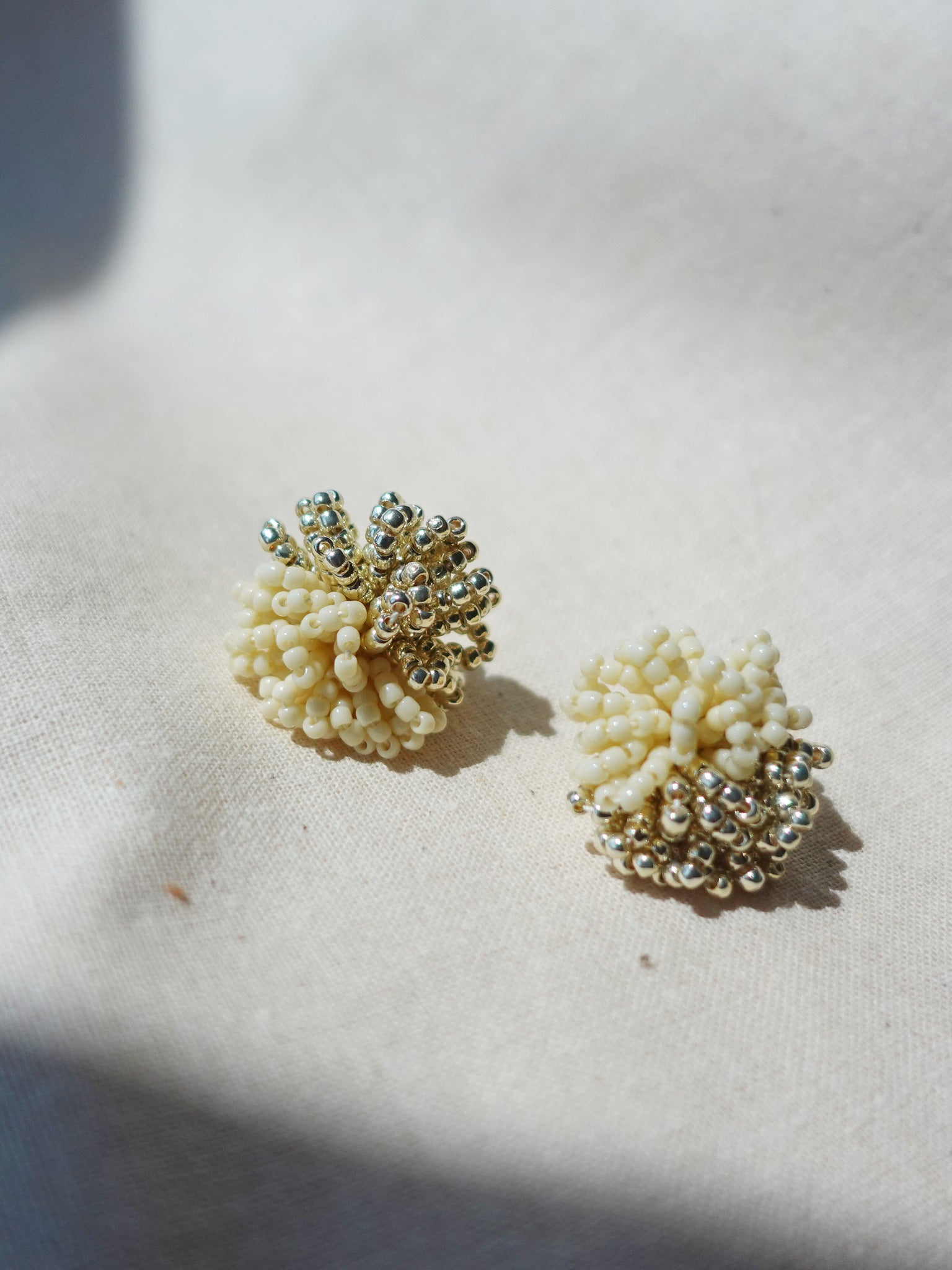Anemone Stud Earrings in Milk White Front