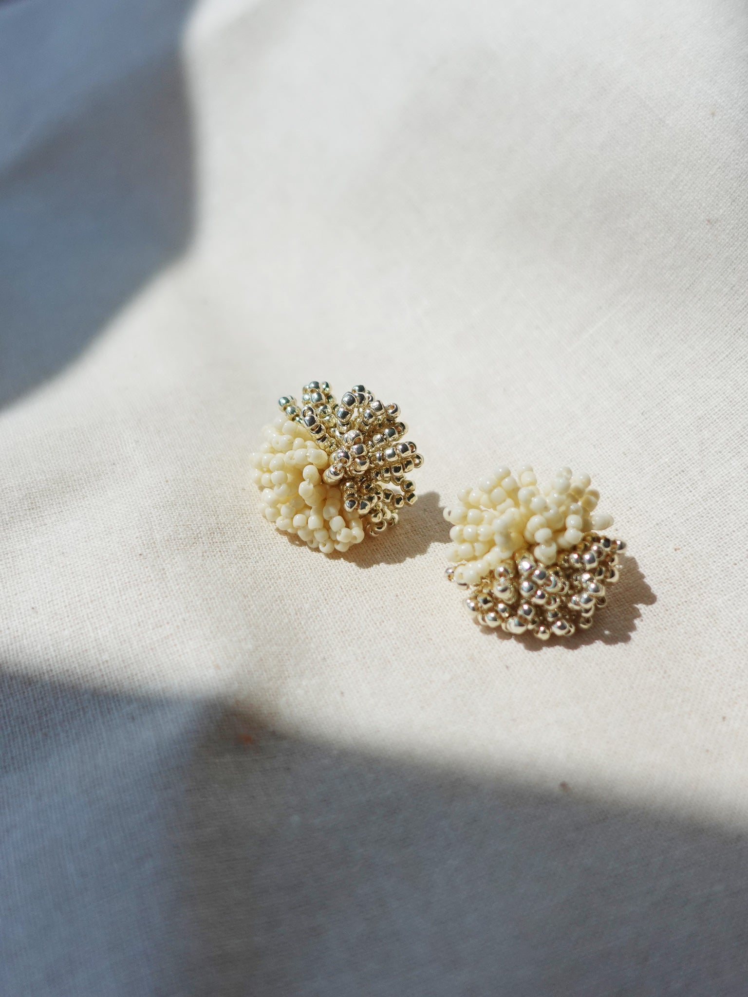 Anemone Stud Earrings in Milk White Left