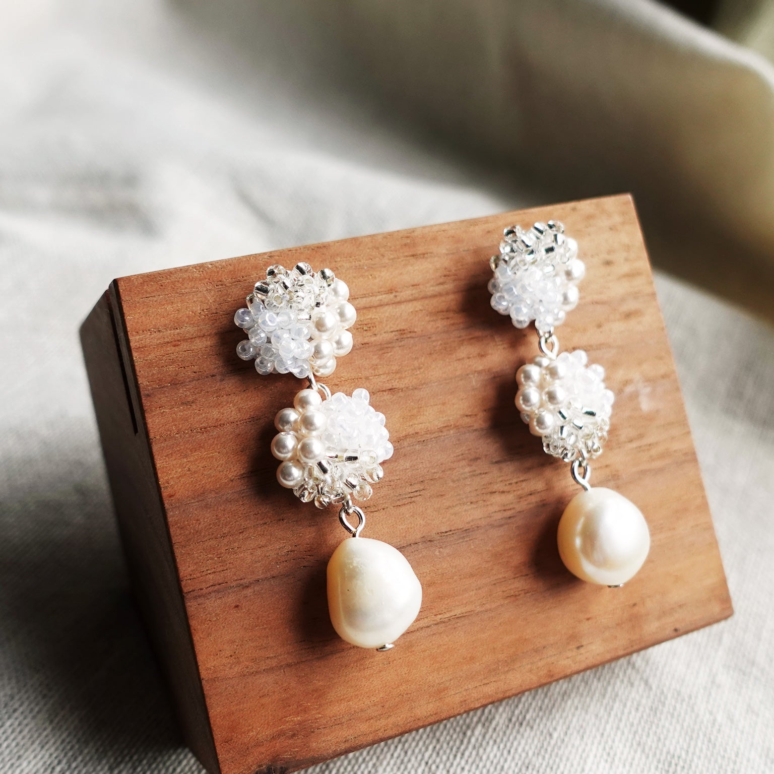 Ariana Richele Earrings in White Display Front