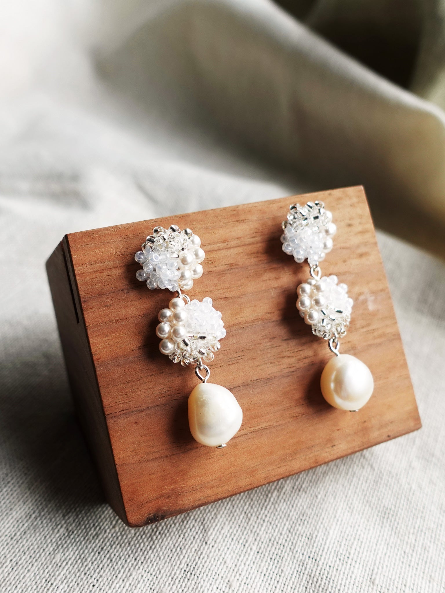 Ariana Richele Earrings in White Display Front