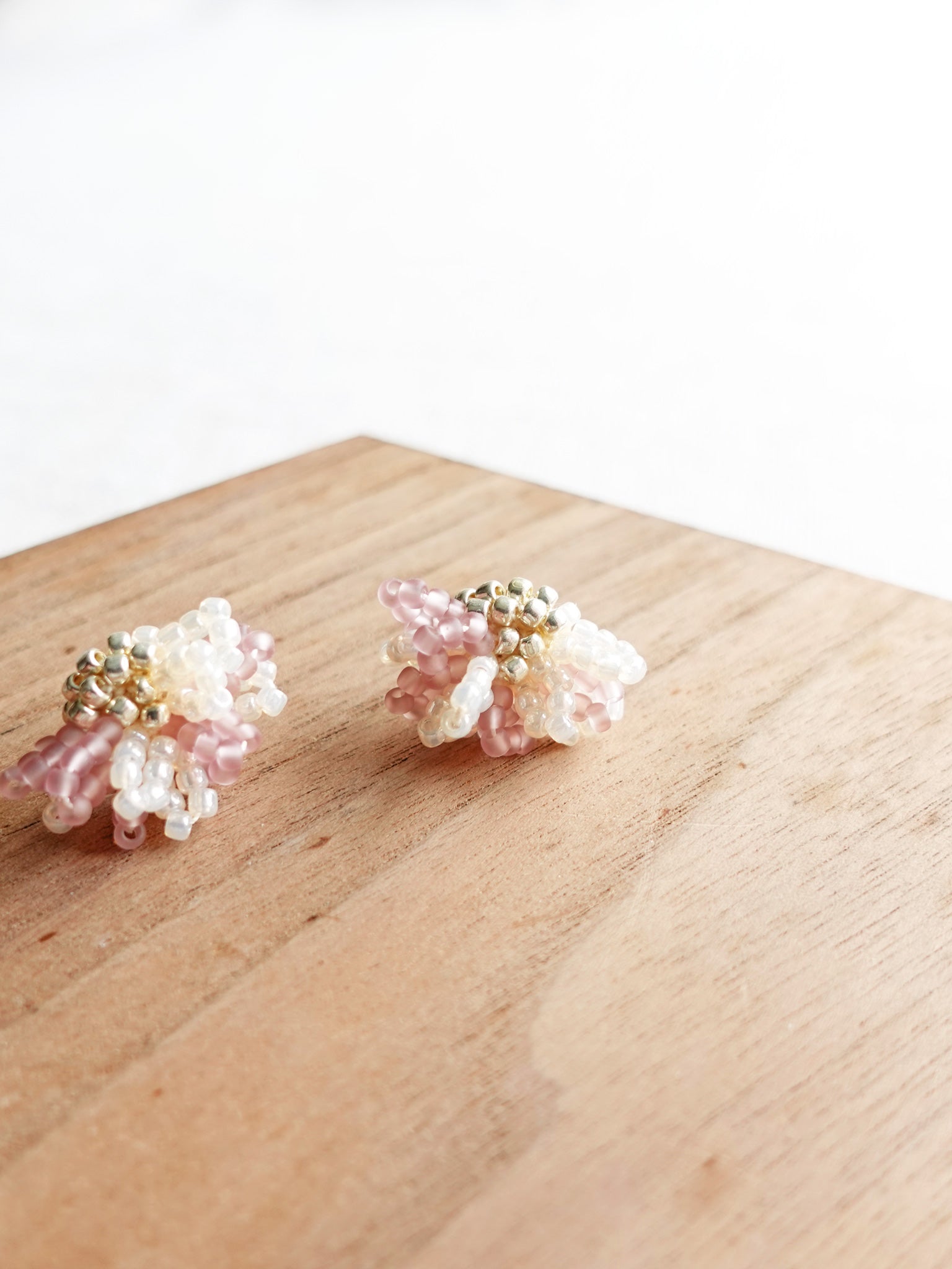 Camellia Bicolor Stud Earrings in Mauve Purple Display