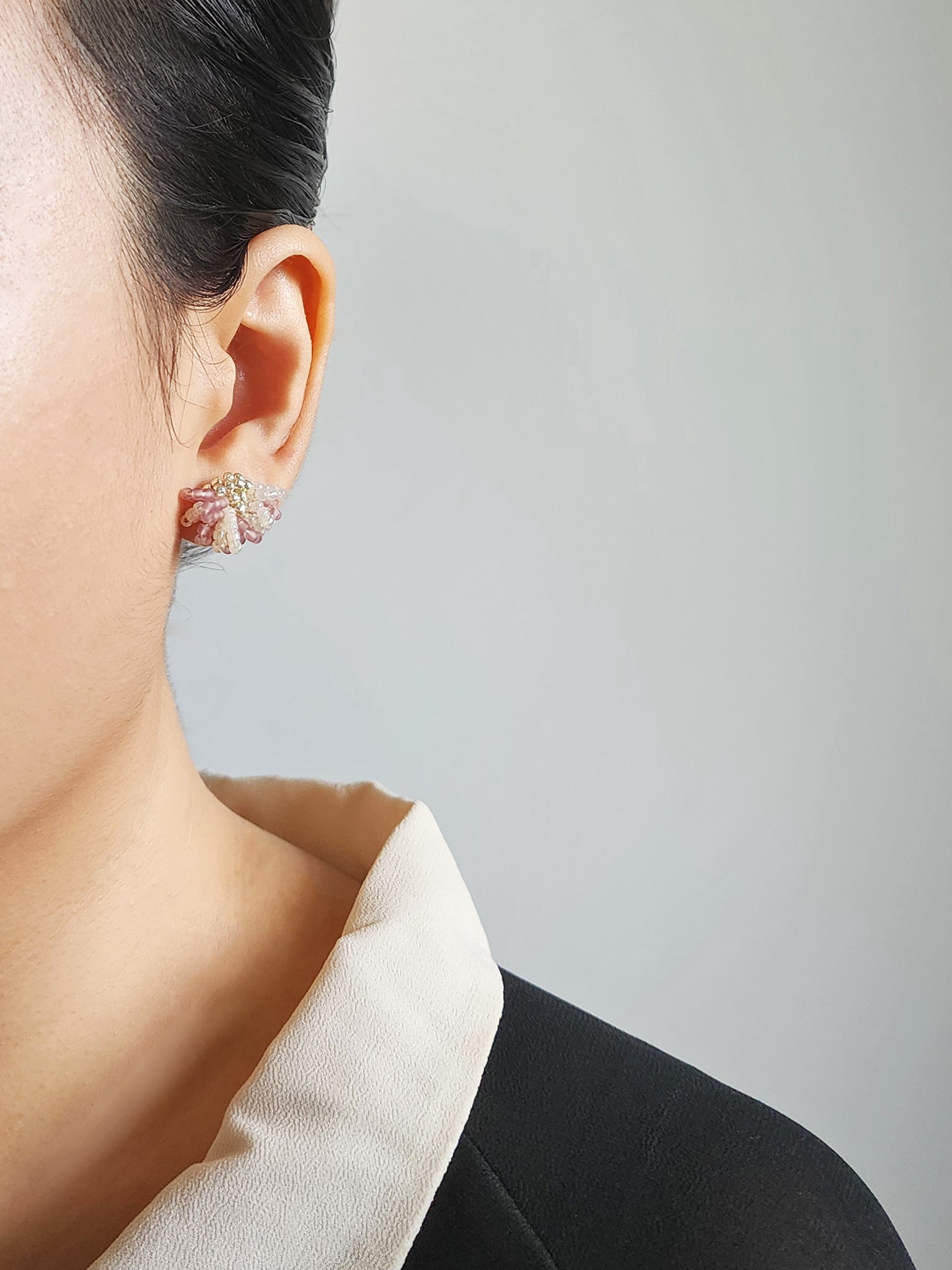 Camellia Bicolor Stud Earrings in Mauve Purple Model