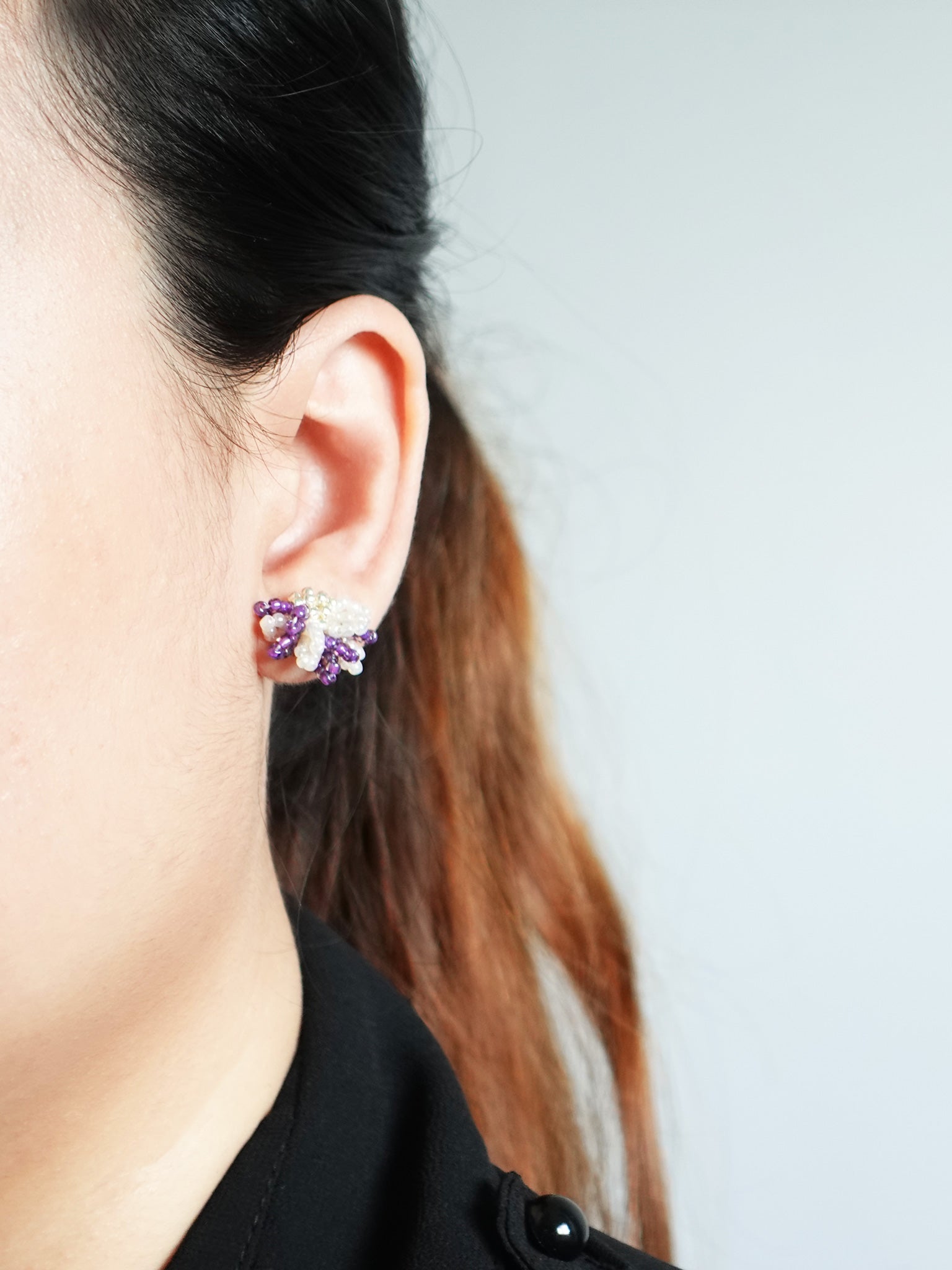 Camellia Bicolor Stud Earrings in Royal Purple Model