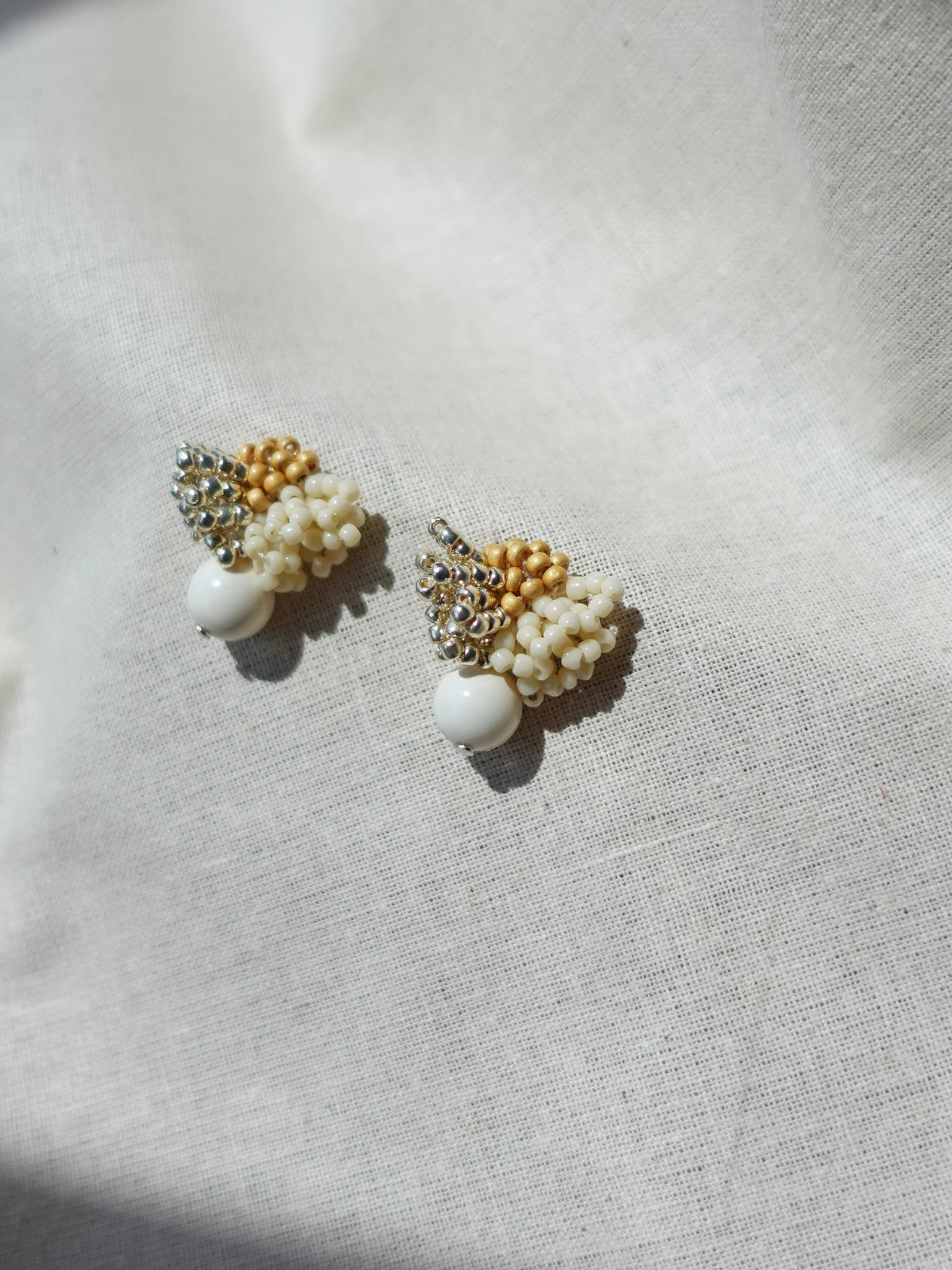 Camellia Cream Drop Earrings in Mustard Yellow Side