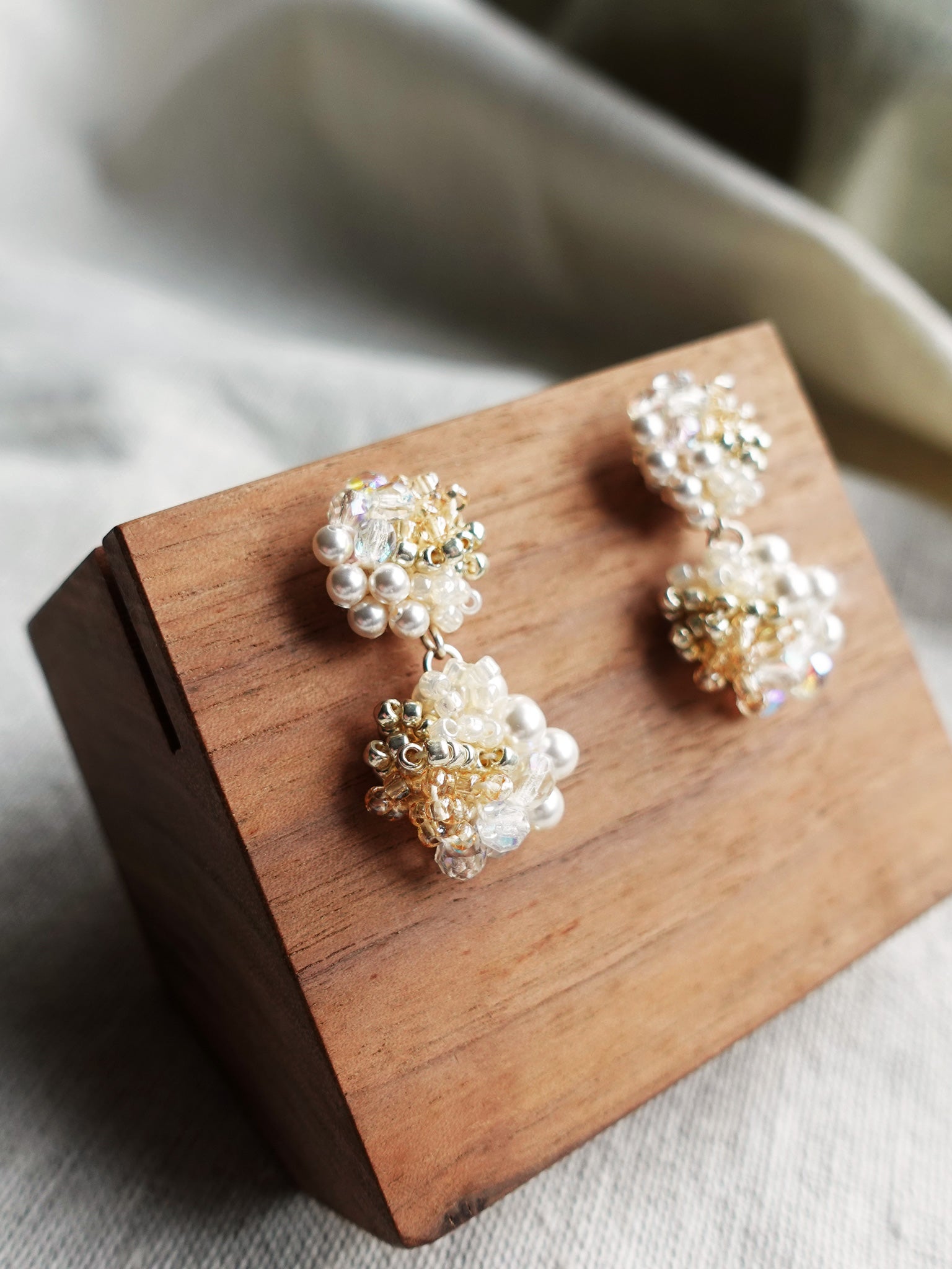 Estellar Earrings in Ivory Display Left