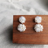Estellar Earrings in White Display Front