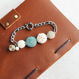 Evardo Bracelet in Ocean Green Book