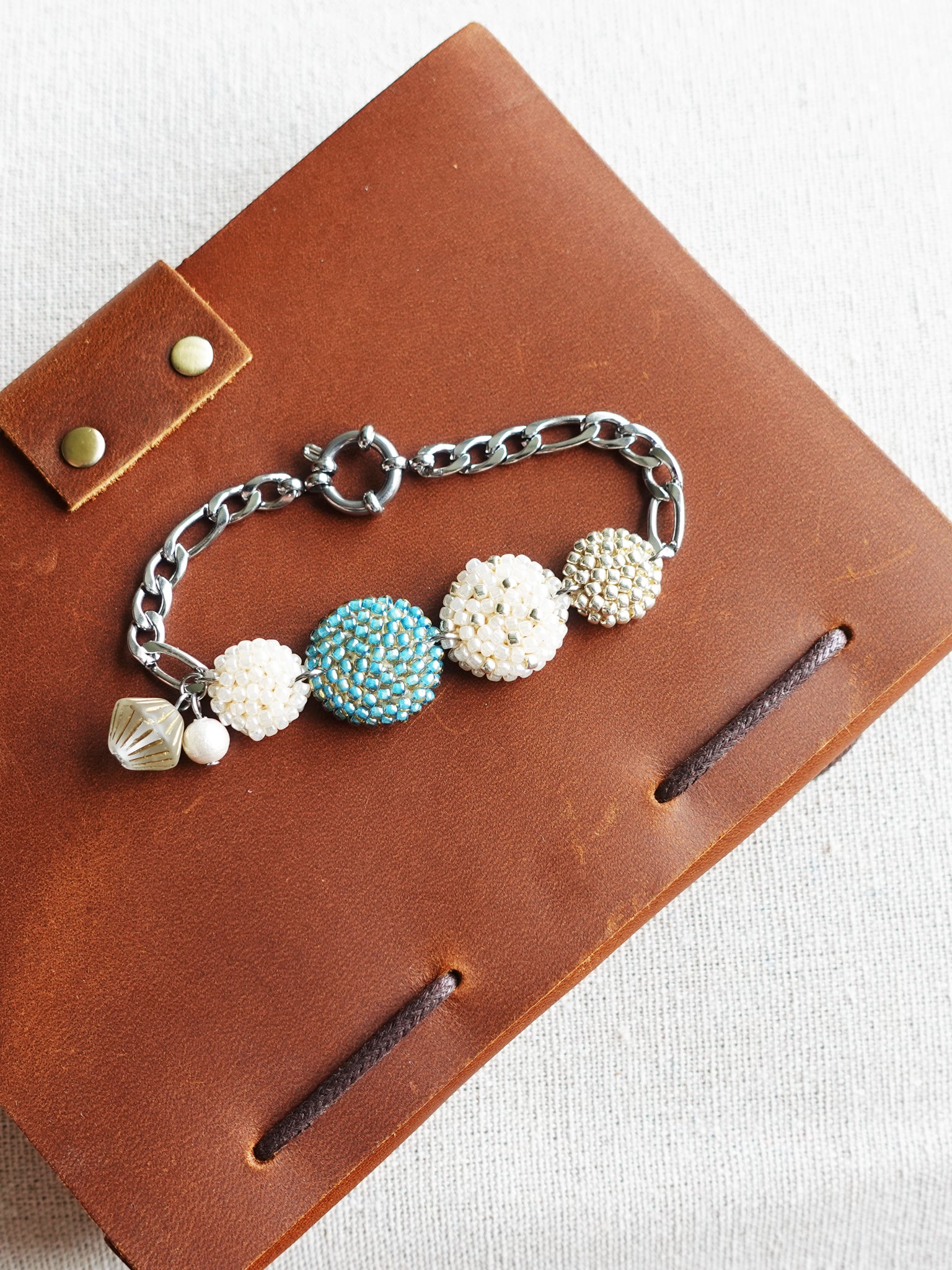Evardo Bracelet in Ocean Green Book