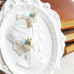 Fantasia Snowball Earrings in Ocean Green Girl