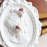 Fantasia Snowball Earrings in Royal Purple Girl