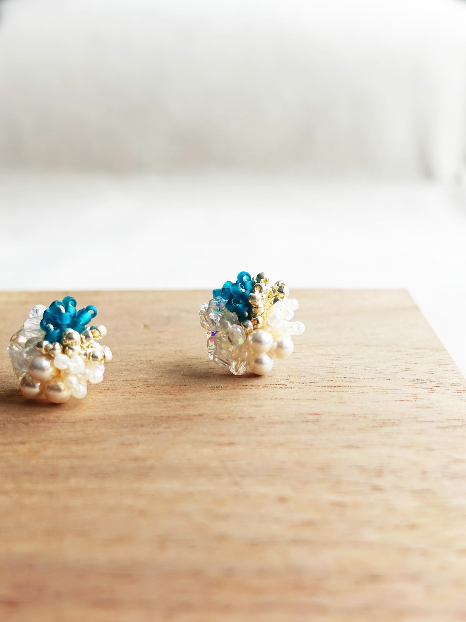 Felisia Stud Earrings in Teal Display Front
