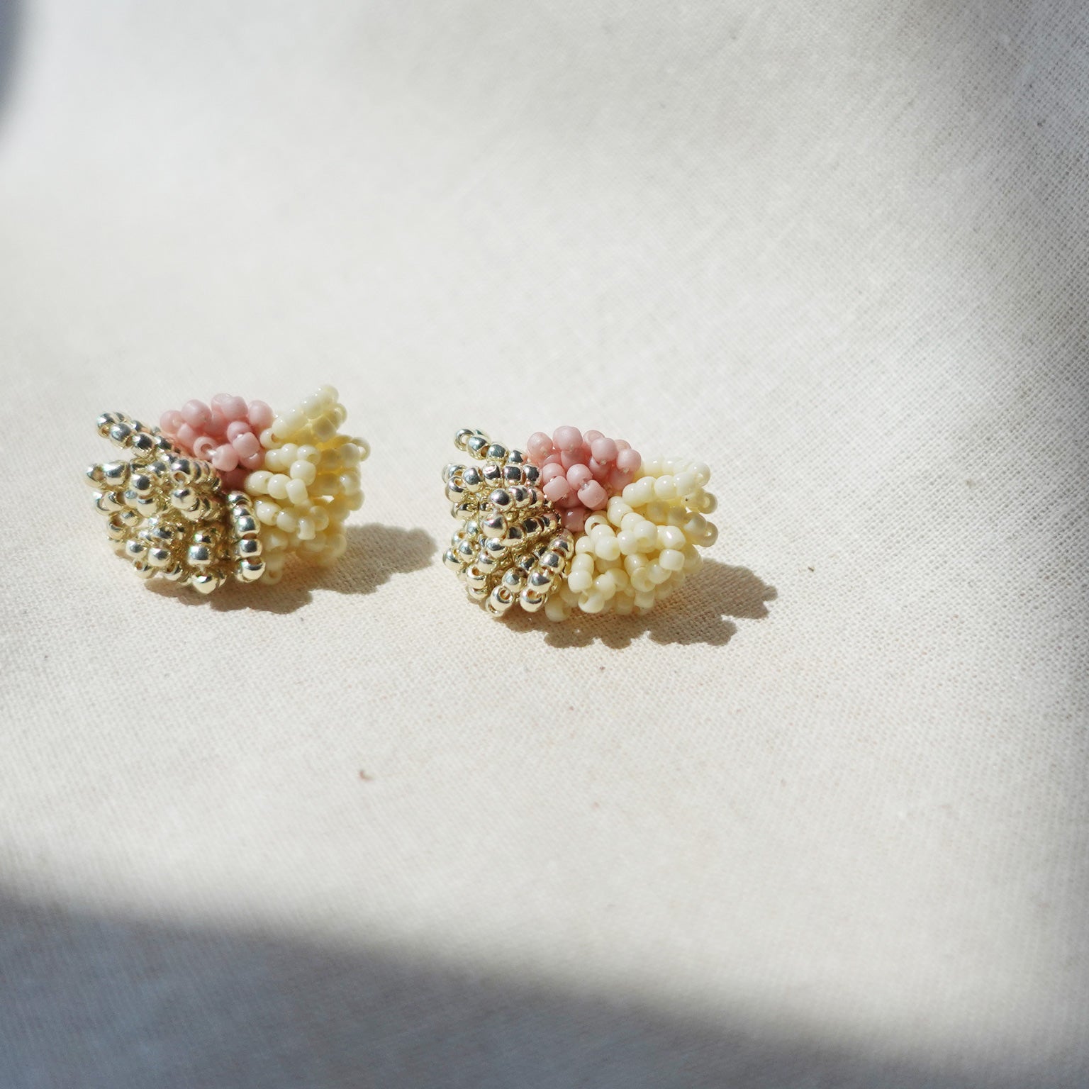 Garde Stud Earrings in Pale Pink Front
