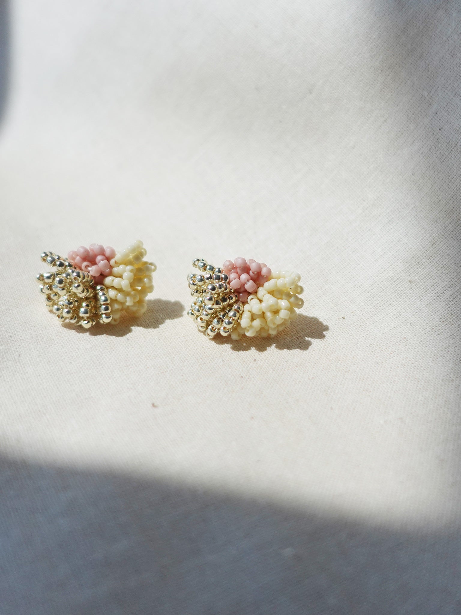 Garde Stud Earrings in Pale Pink Front