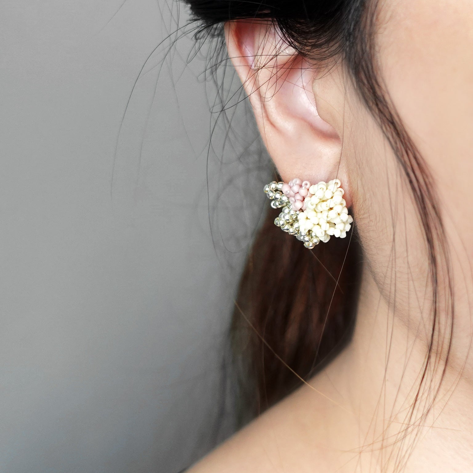 Garde Stud Earrings in Pale Pink Model