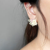 Garde Stud Earrings in Pale Pink Model