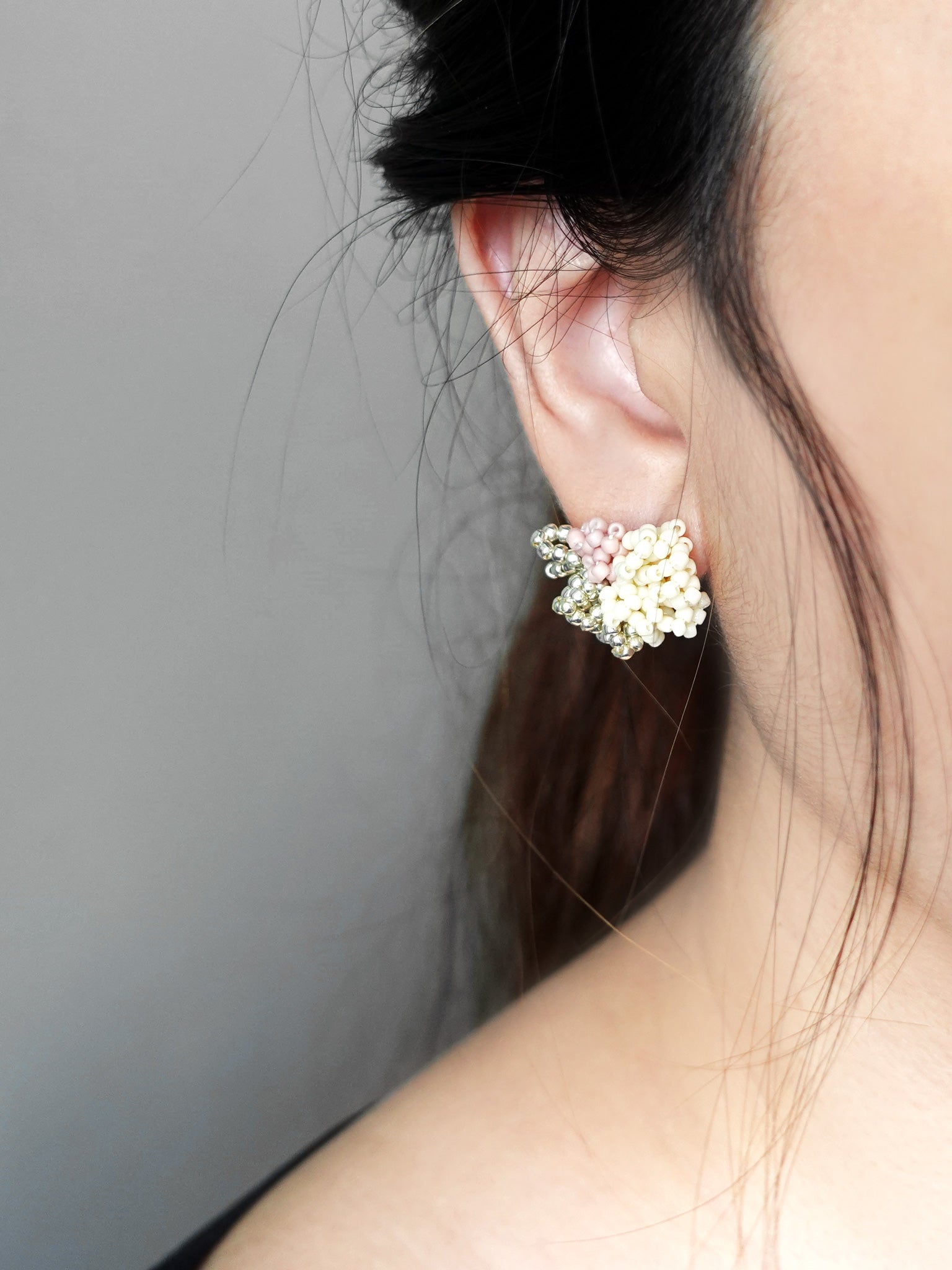 Garde Stud Earrings in Pale Pink Model