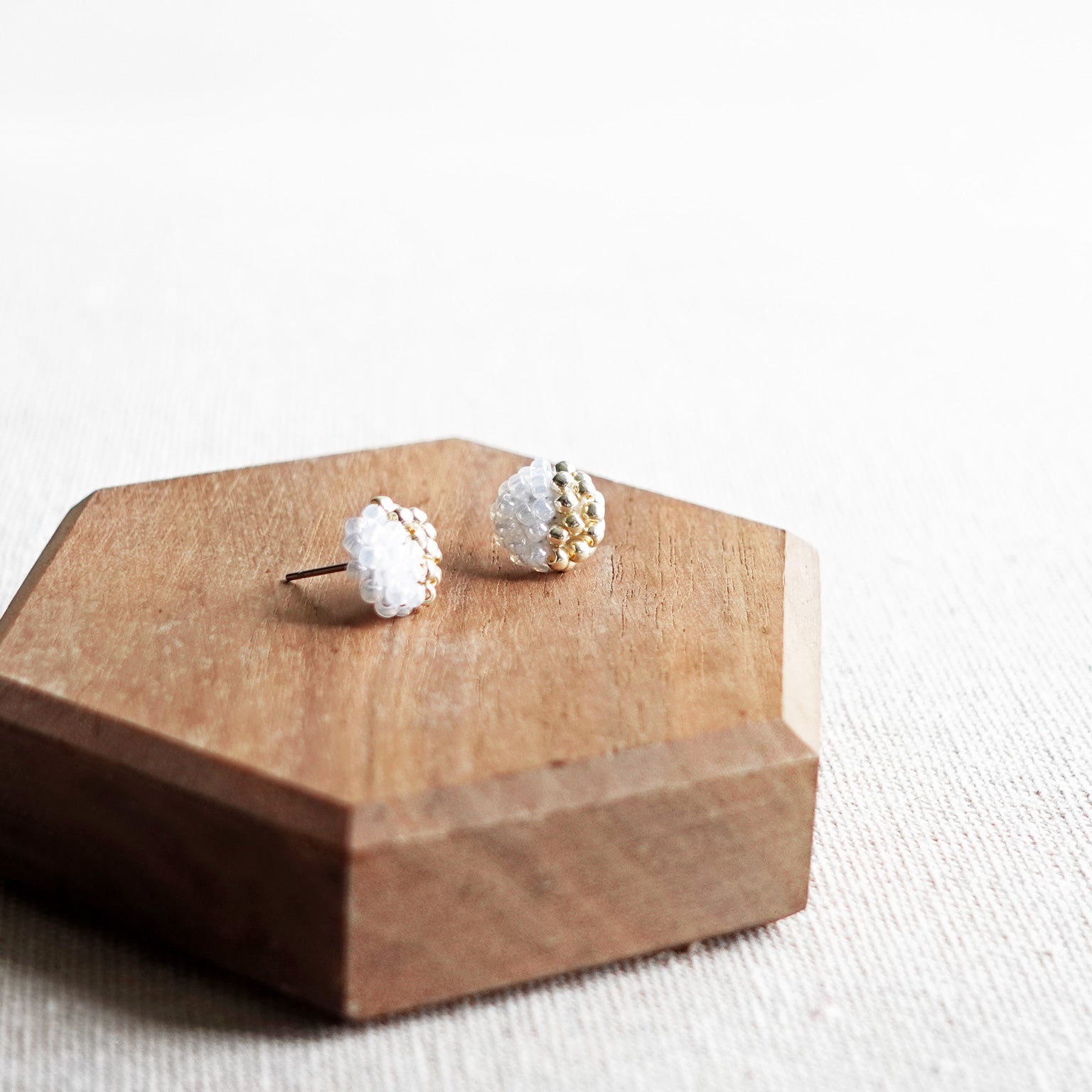 Last Quarter Petite Stud Earrings in White Display Front