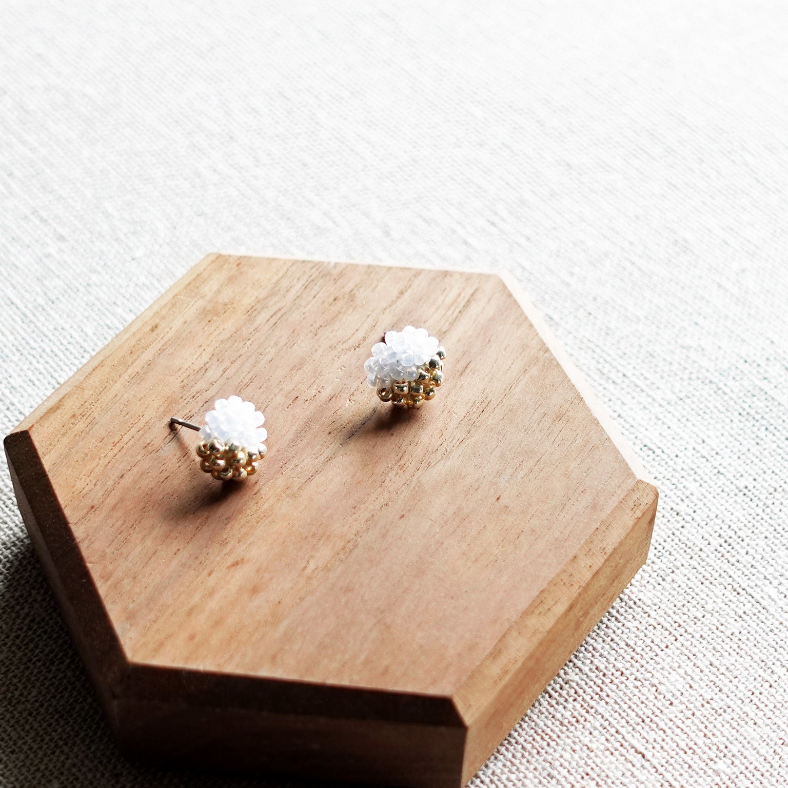 Last Quarter Petite Stud Earrings in White Display Top Down