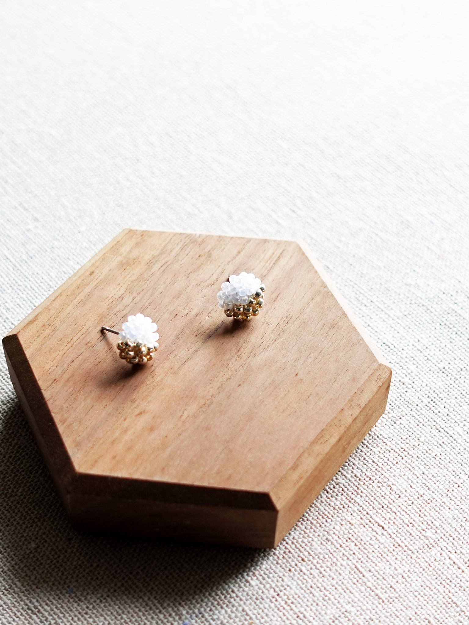Last Quarter Petite Stud Earrings in White Display Top Down
