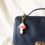Magical Mushroom Charm in Red Bag Right