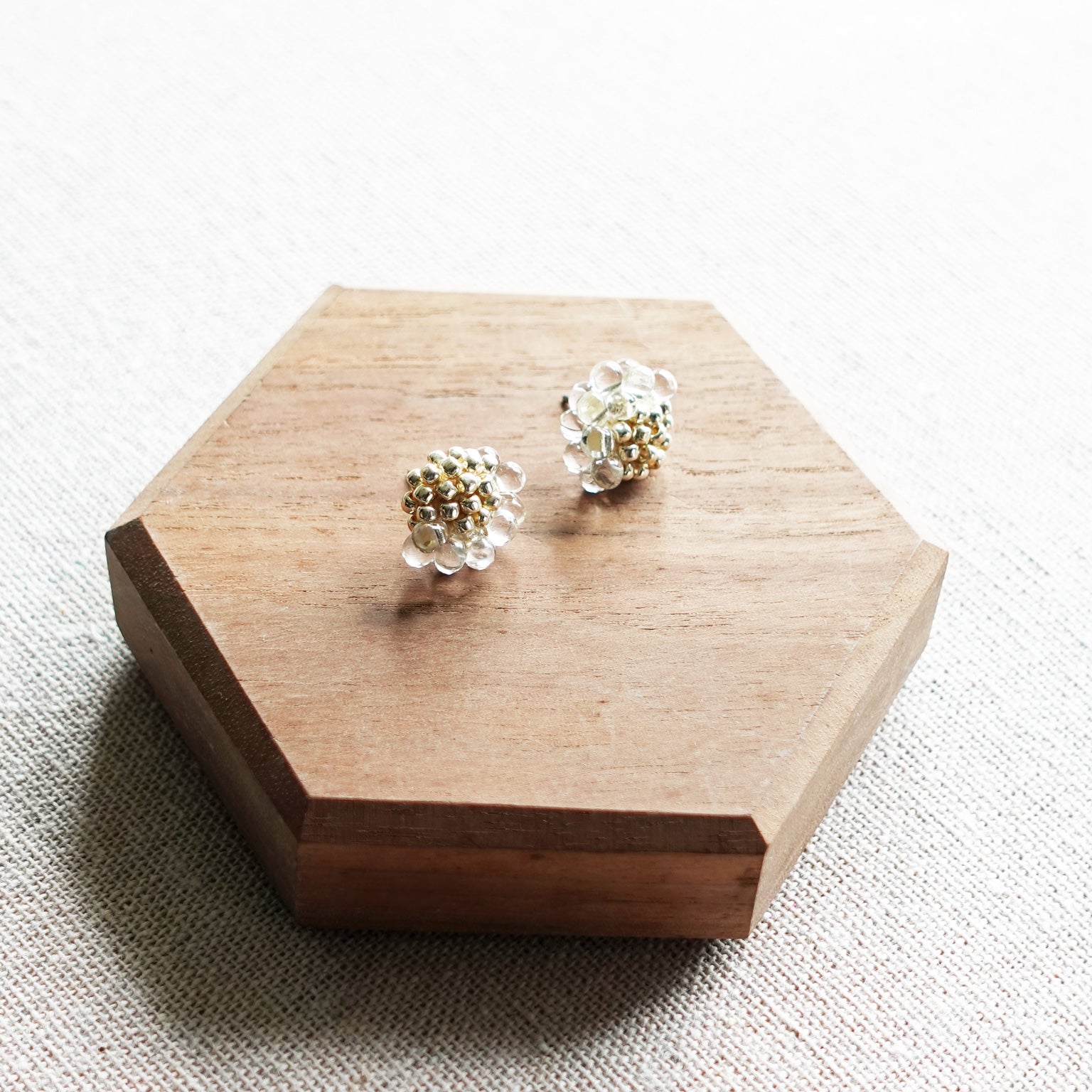 Ophira Stud Earrings in Gold Display Top Down