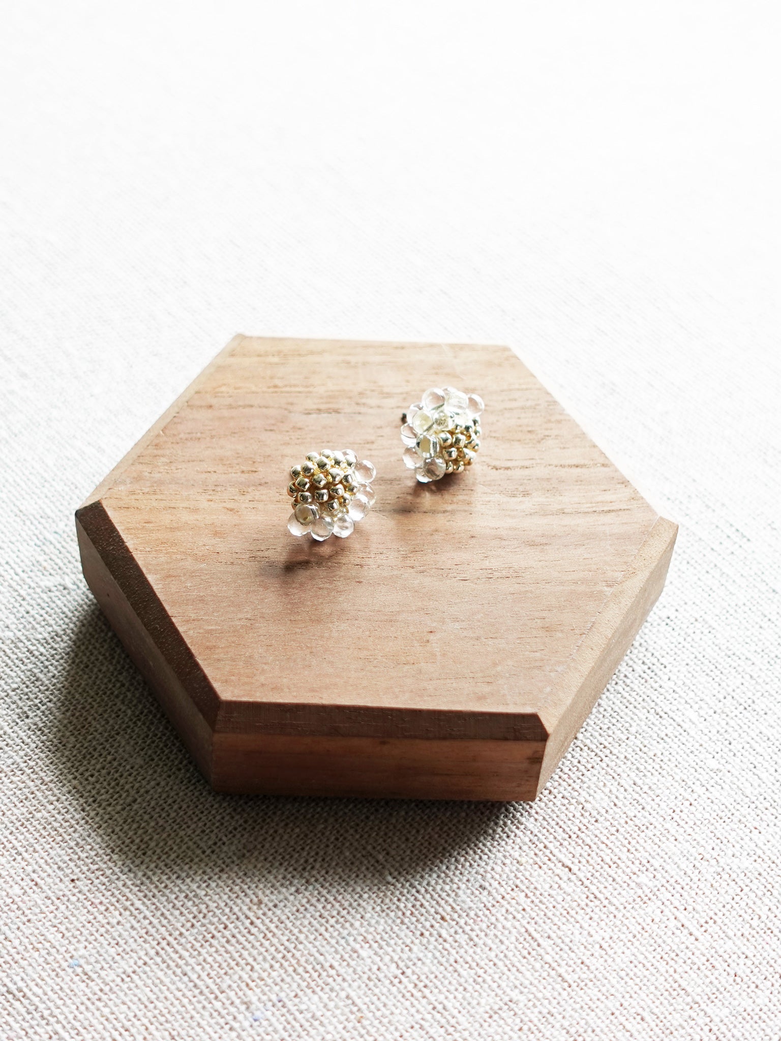 Ophira Stud Earrings in Gold Display Top Down