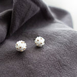Orb Star Dust Stud Earrings in Cloud White Left