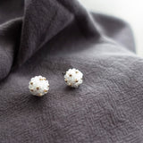 Orb Star Dust Stud Earrings in Cloud White Left