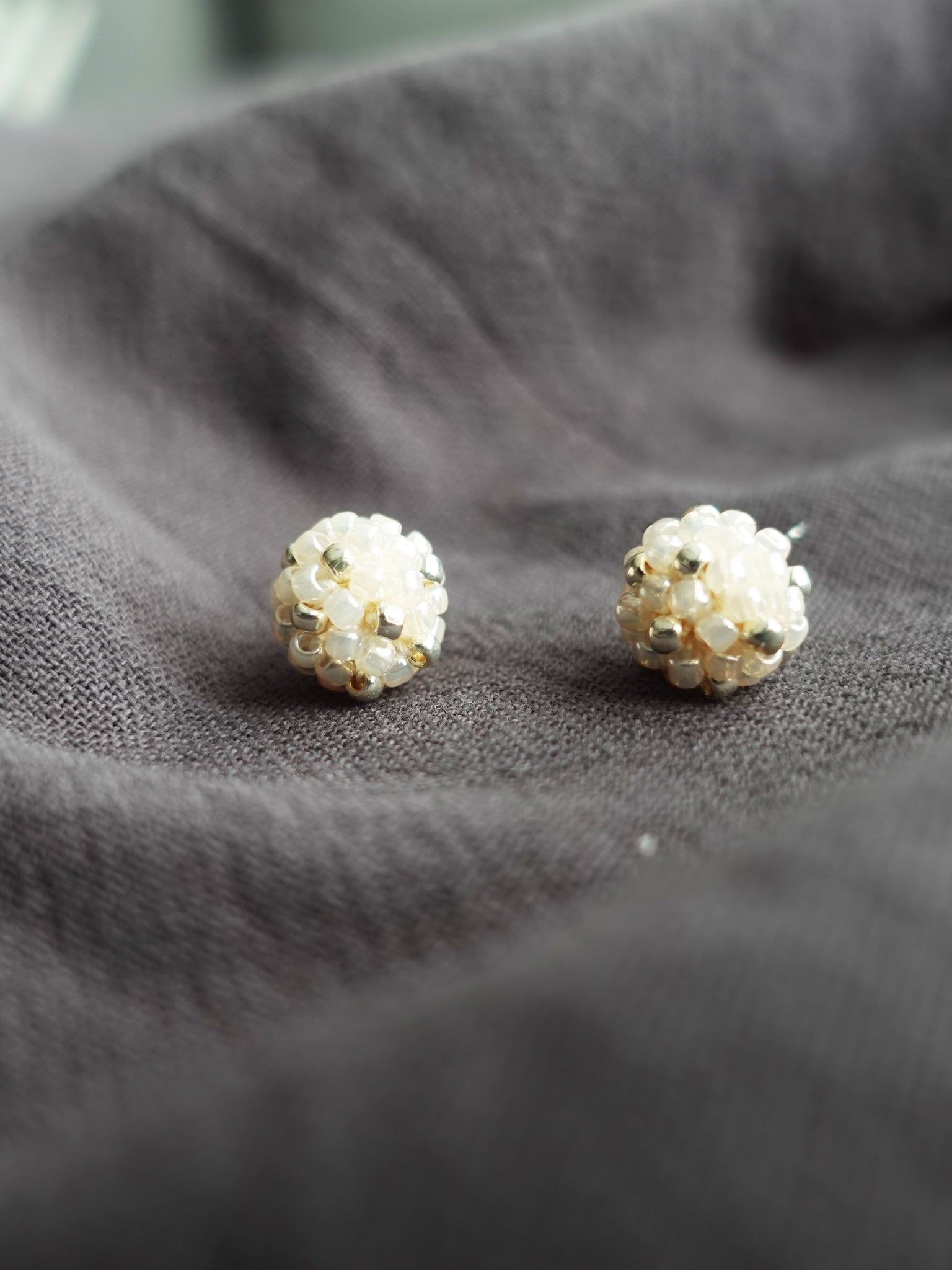 Orb Star Dust Stud Earrings in Ivory Front