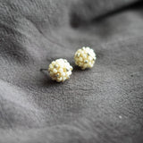 Orb Star Dust Stud Earrings in Milk White Front