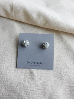 Orb Star Dust Stud Earrings in Smoke Grey Card