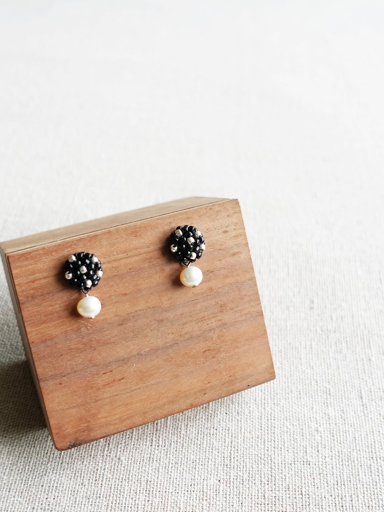 Phoebe Star Dust Earrings in Black Display Right