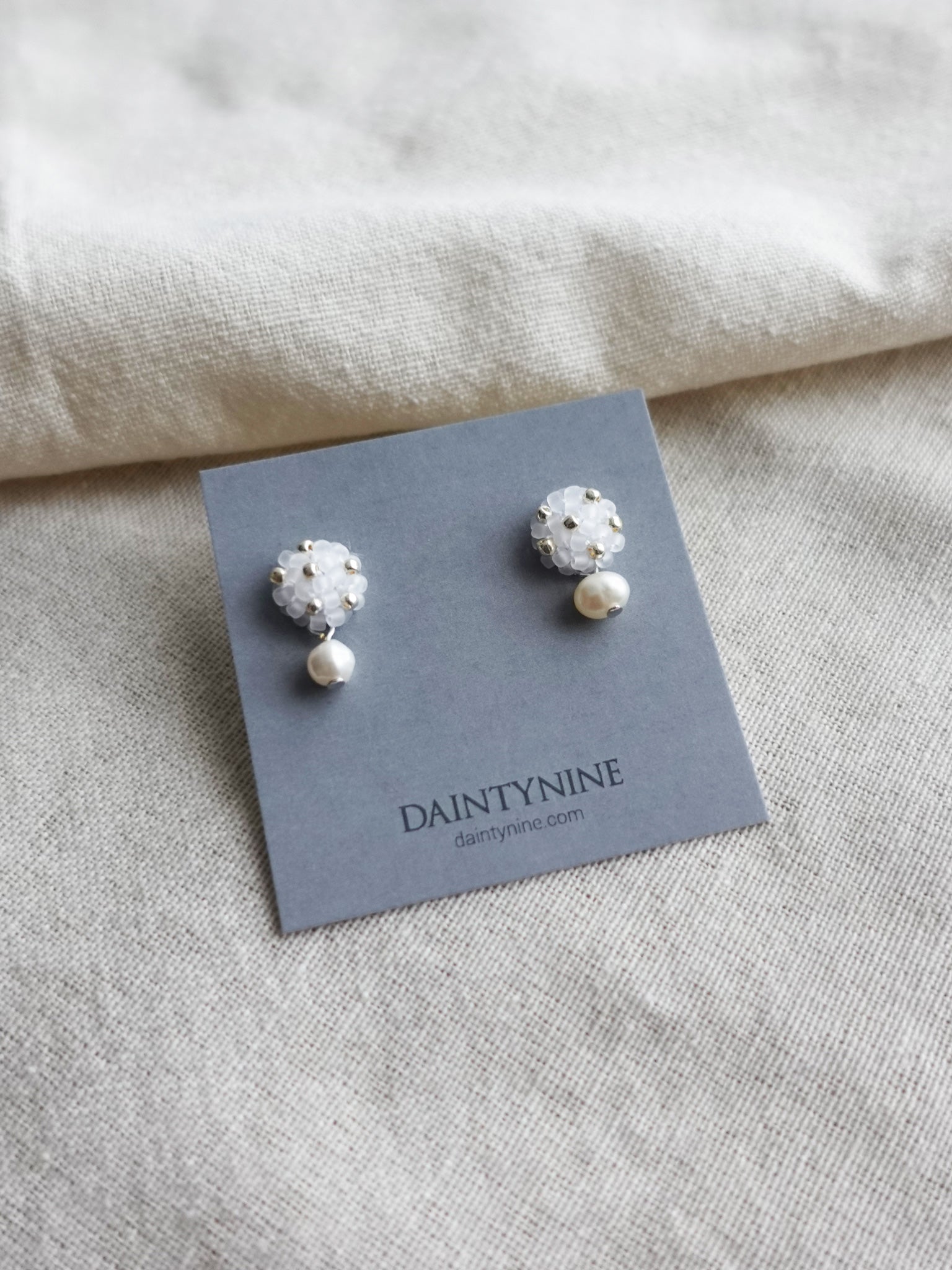 Phoebe Star Dust Earrings in Cloud White Card