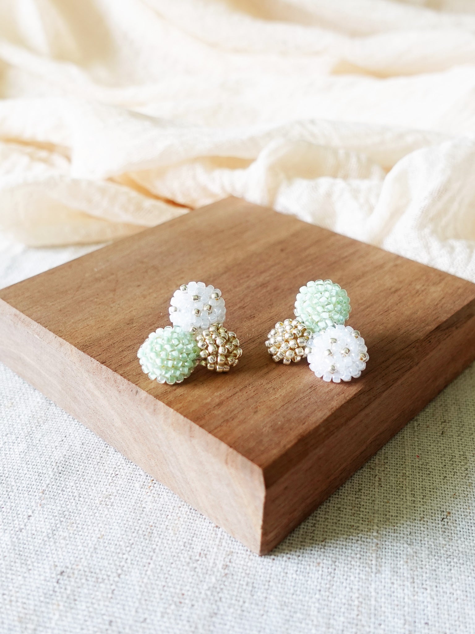 Planetarium Stud Earrings in Mint Green Display