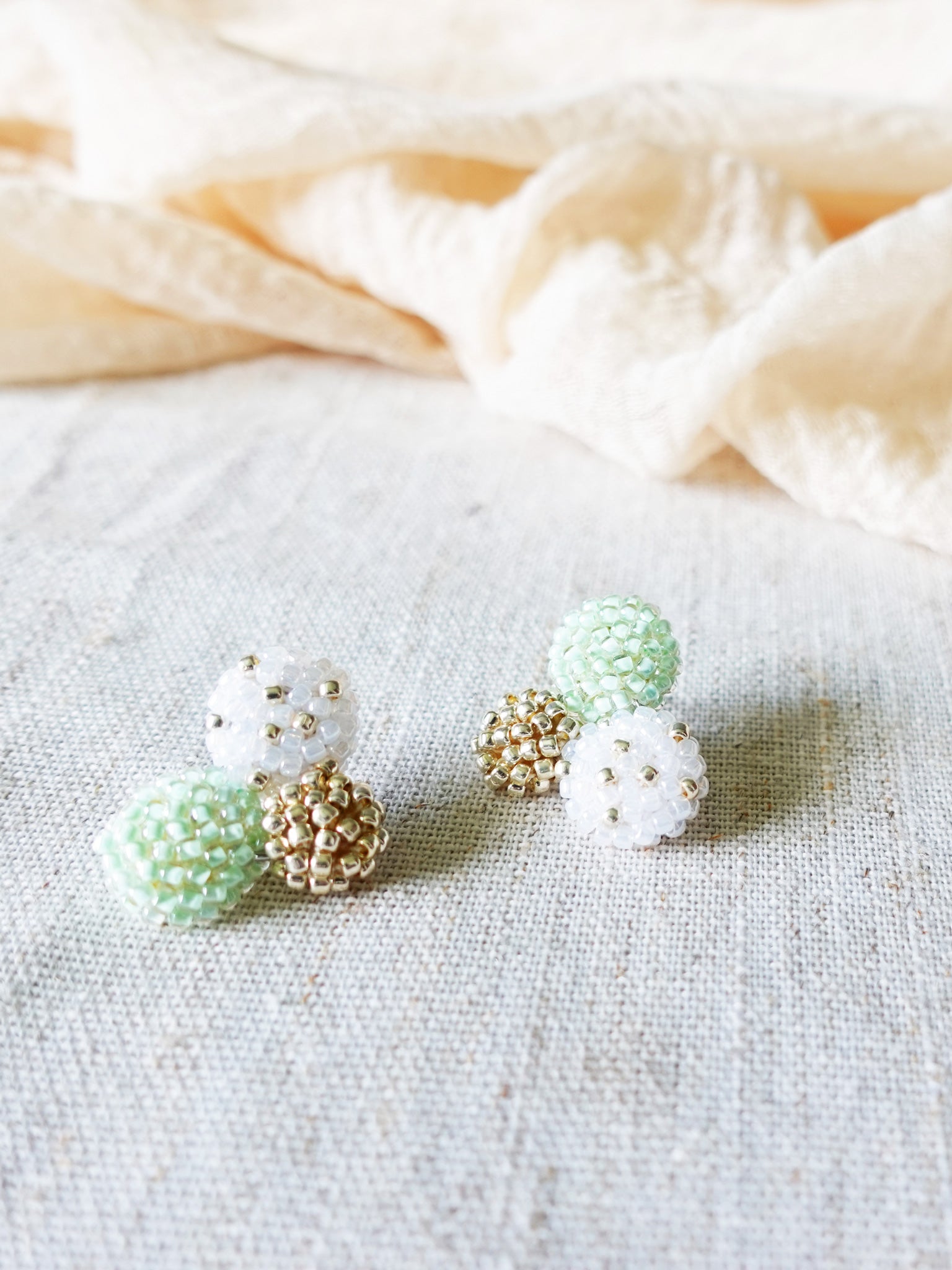 Planetarium Stud Earrings in Mint Green Left