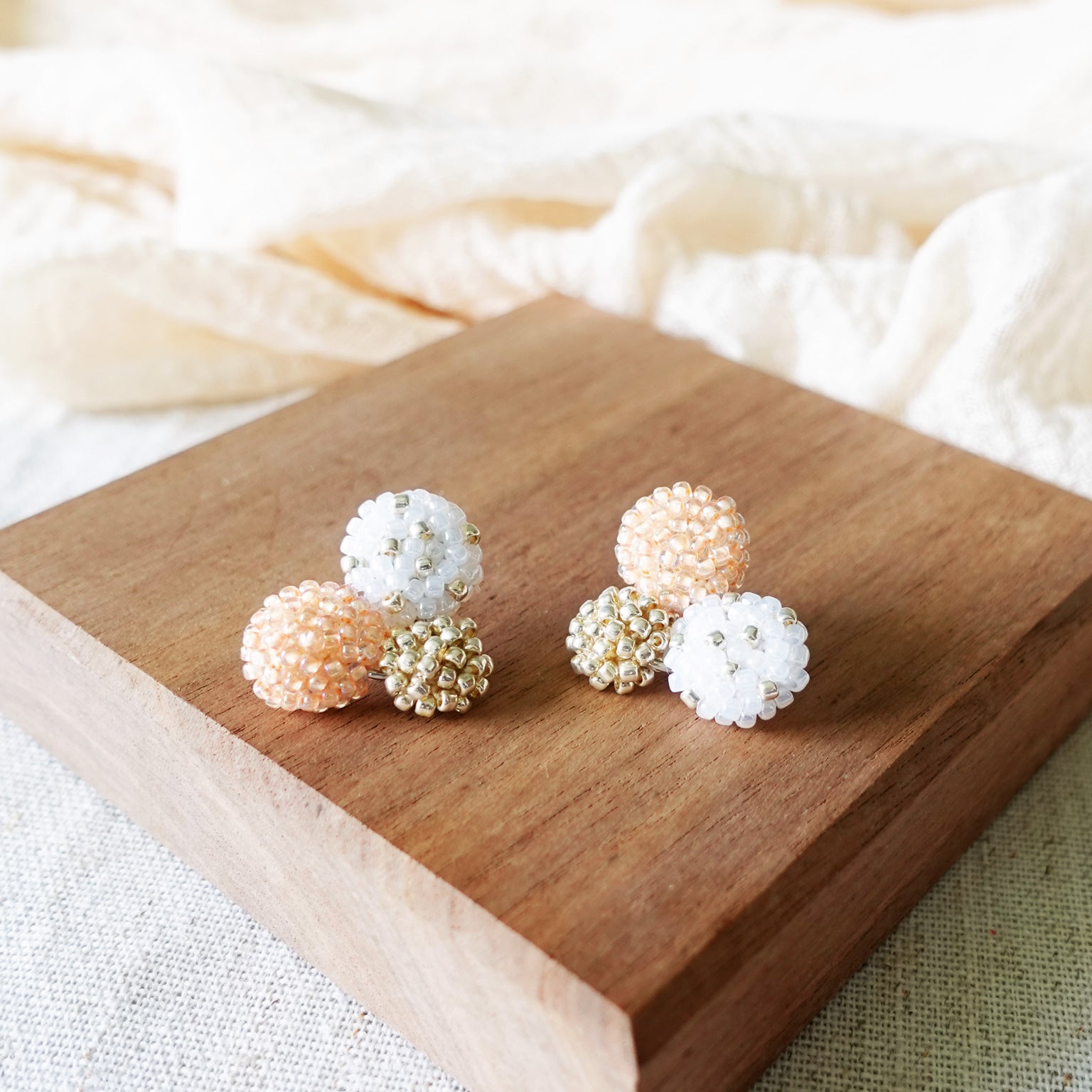 Planetarium Stud Earrings in Orange Display Front
