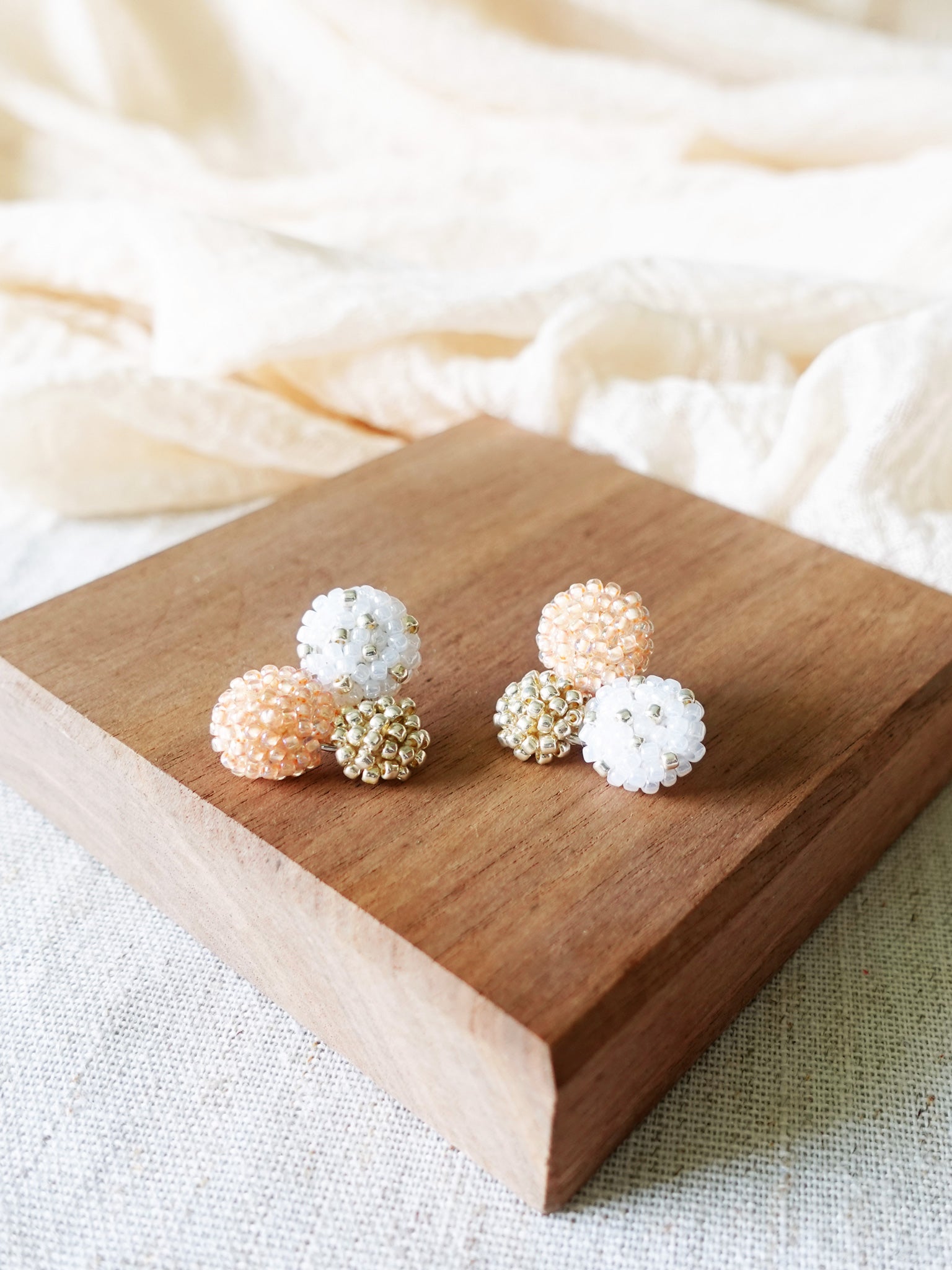 Planetarium Stud Earrings in Orange Display Front