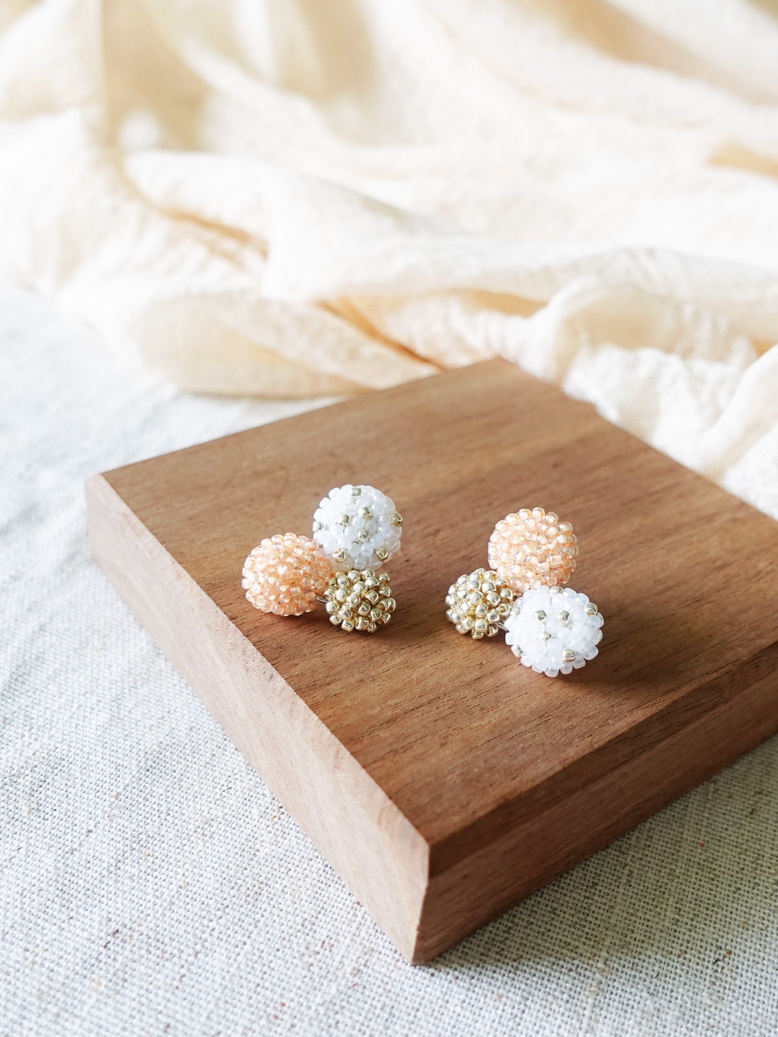 Planetarium Stud Earrings in Orange Display Right