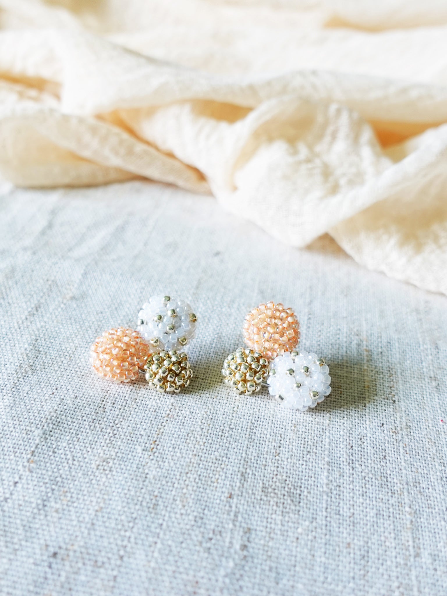 Planetarium Stud Earrings in Orange Front