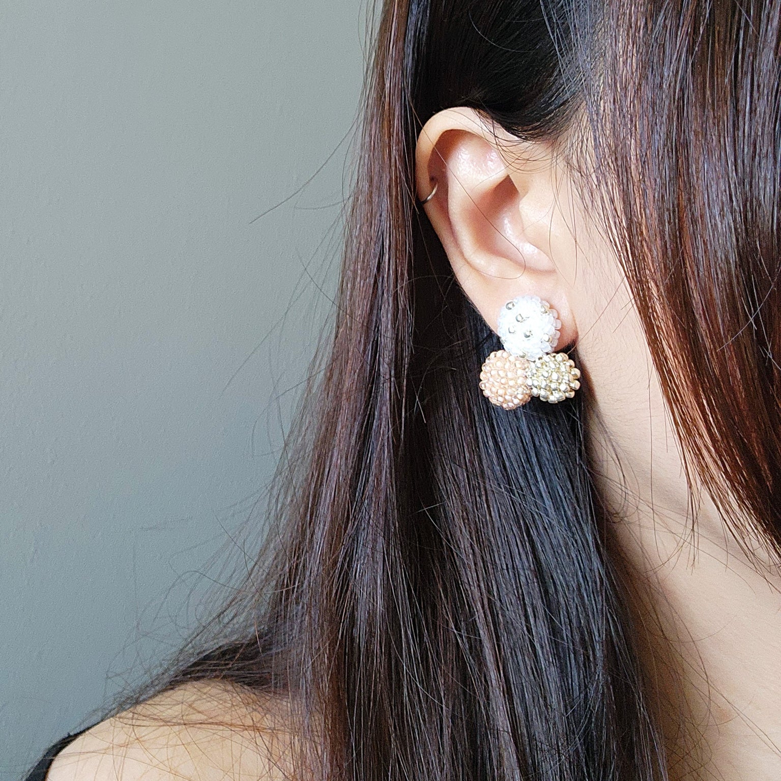 Planetarium Stud Earrings in Orange Model