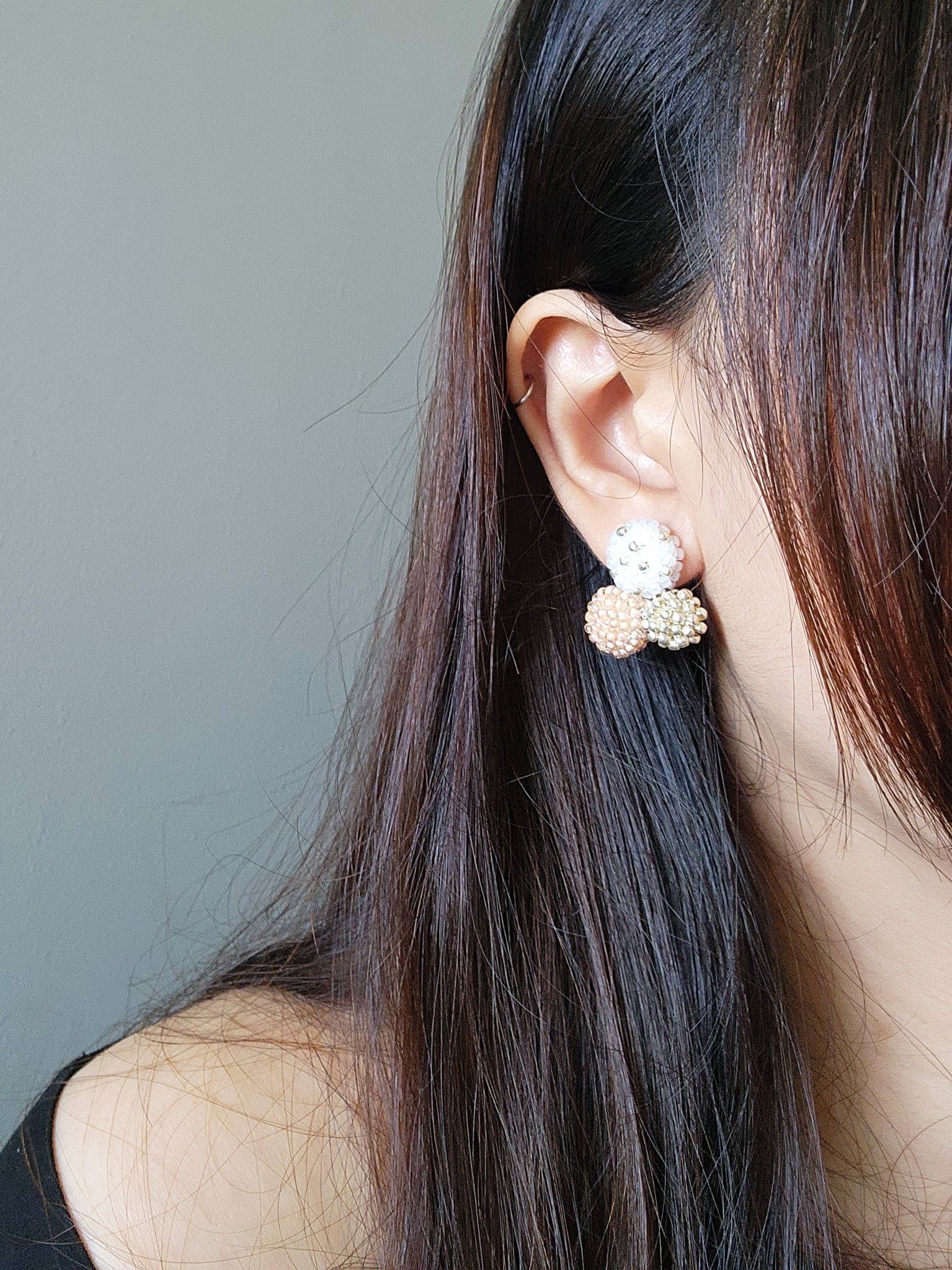 Planetarium Stud Earrings in Orange Model