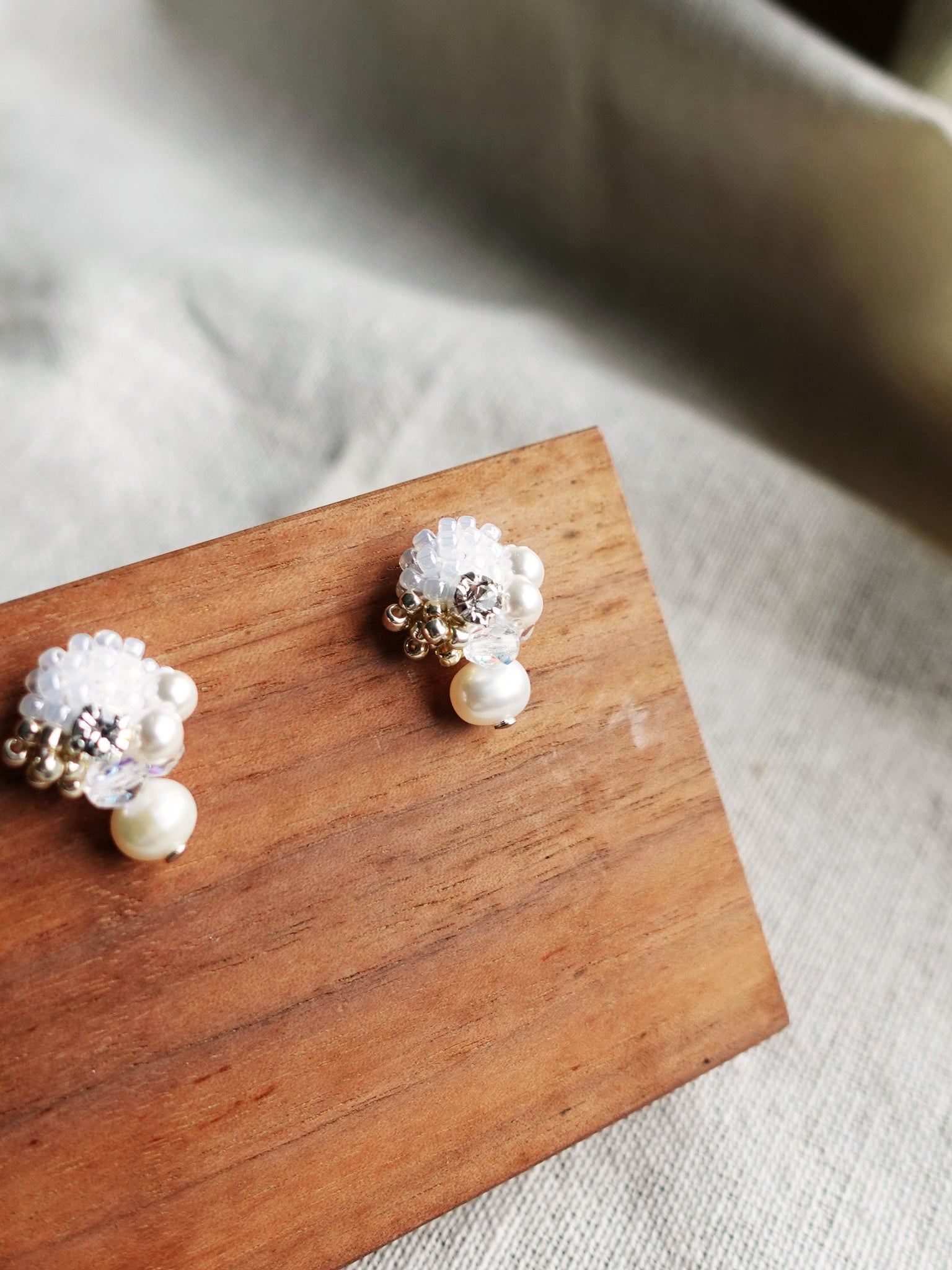 Polaris Phoebe Earrings in White Right Left