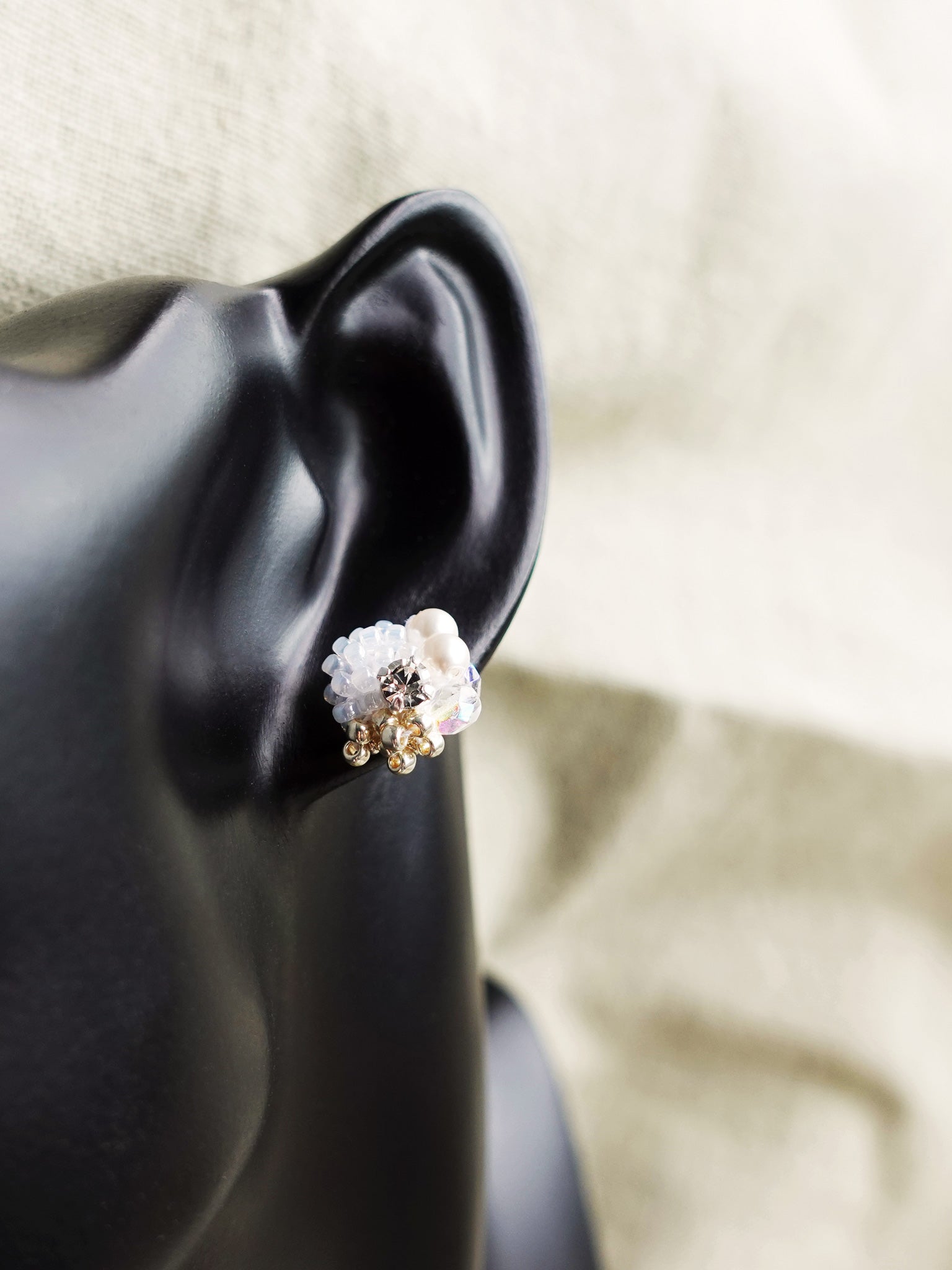 Polaris Stud Earrings in White Bust