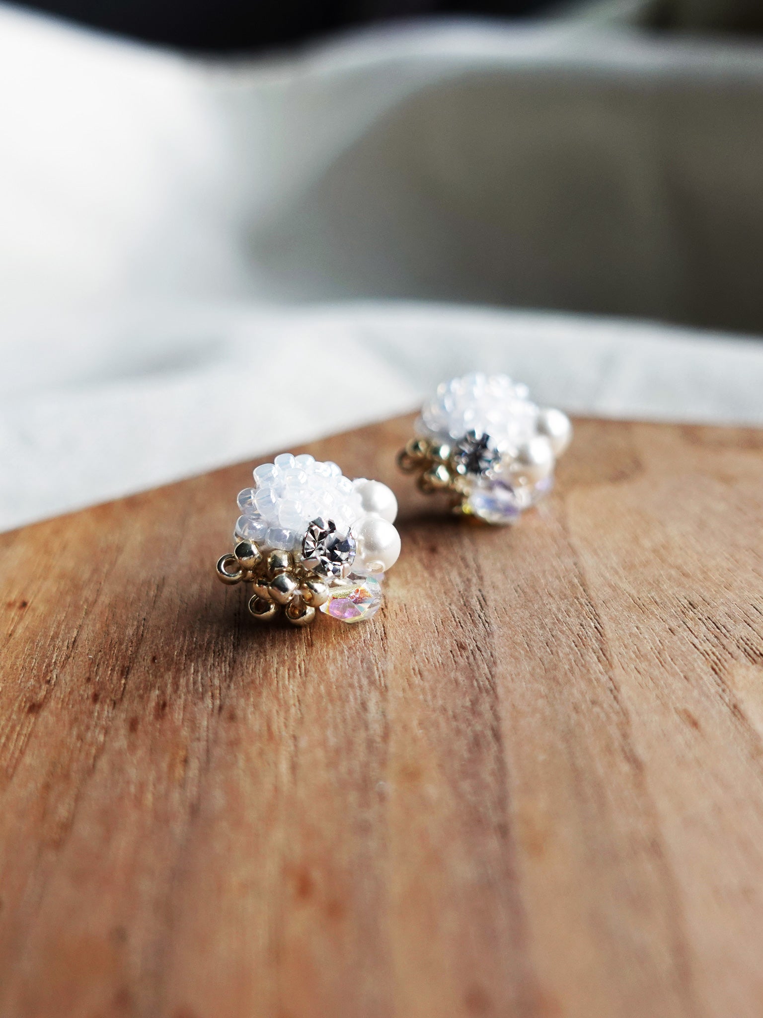 Polaris Stud Earrings in White Display Left