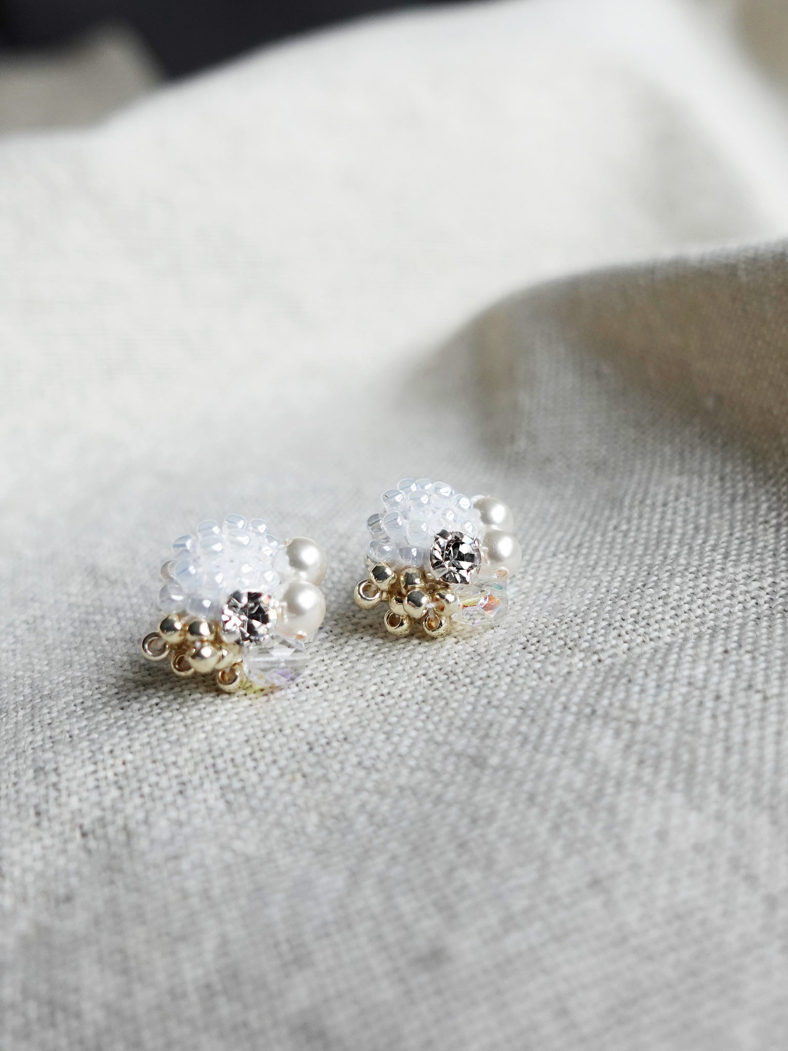 Polaris Stud Earrings in White Left 1