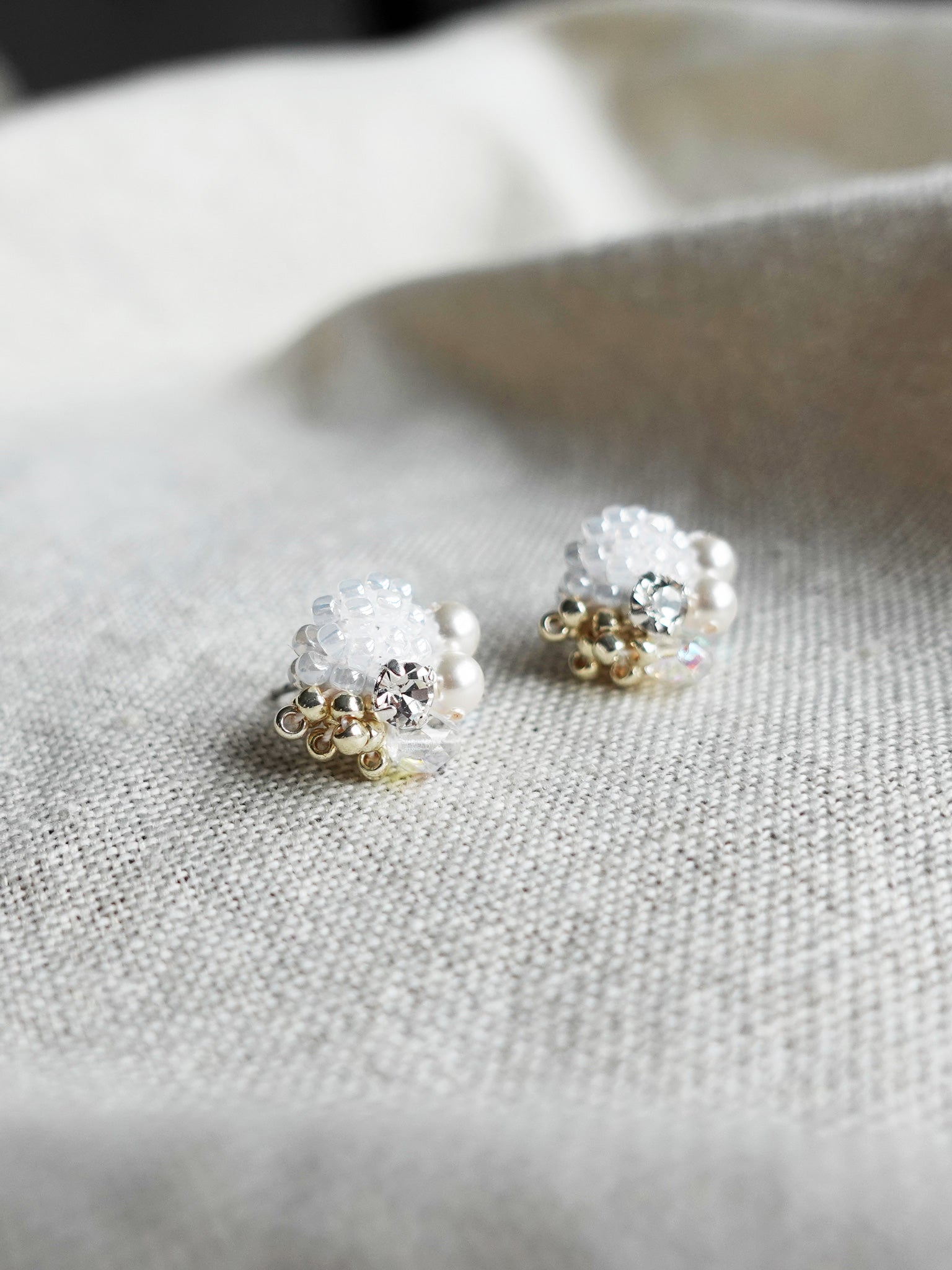 Polaris Stud Earrings in White Left 2