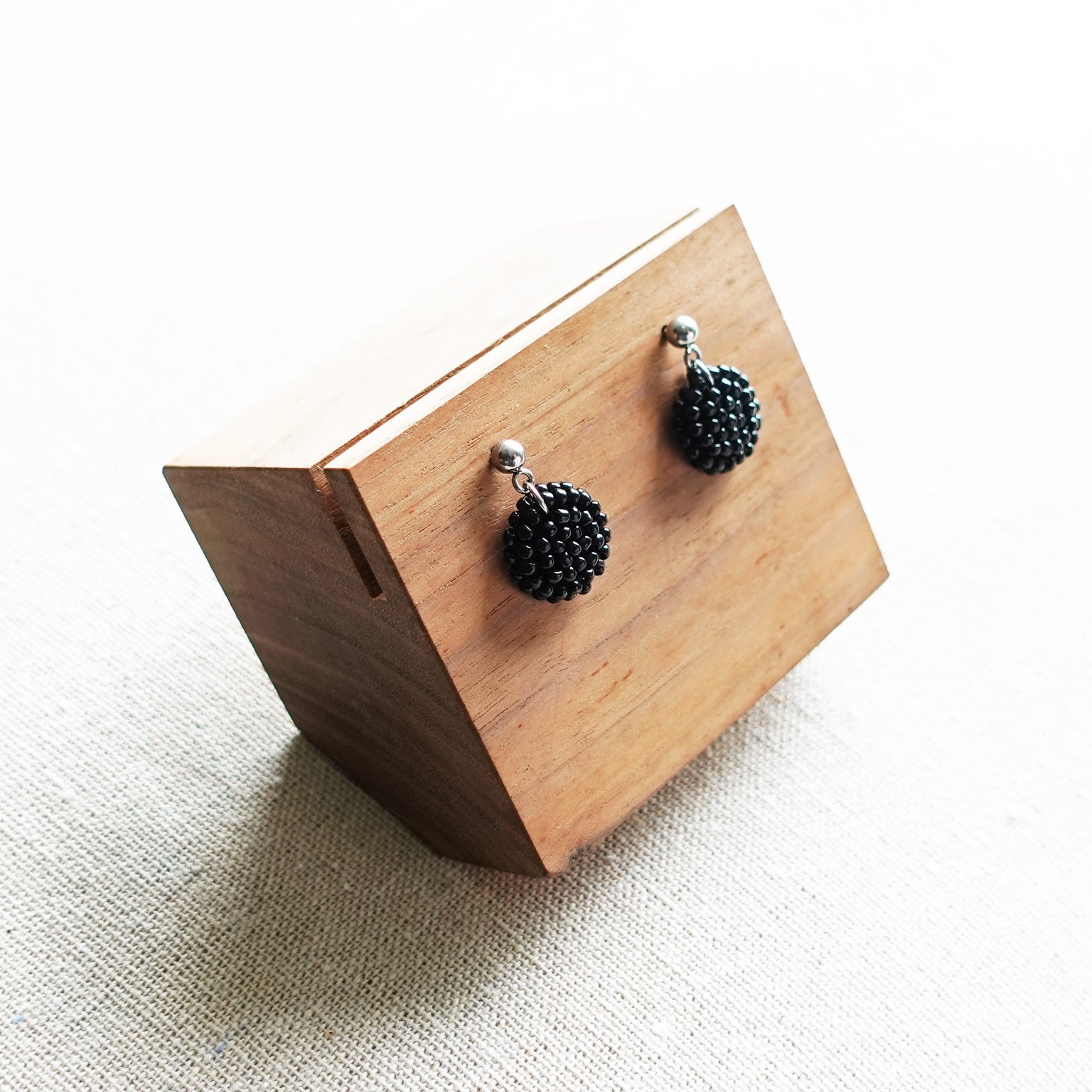 Prelude Delica Drop Earrings in Black Display