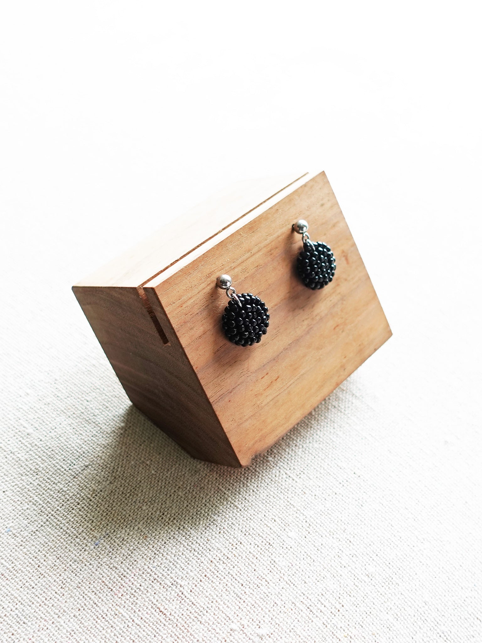 Prelude Delica Drop Earrings in Black Display